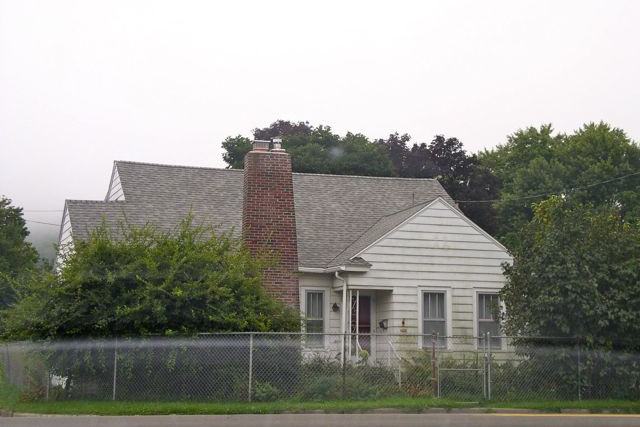 Front view of house and foliage 